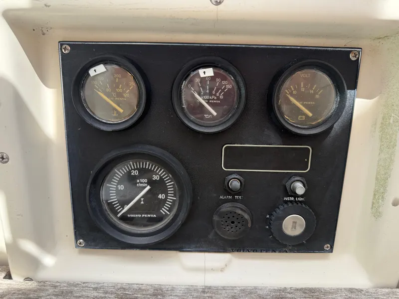 Slide: The Image of Instrument panel of a 1994 Pacific Seacraft Pilothouse 32 with Volvo Penta gauges. - 15