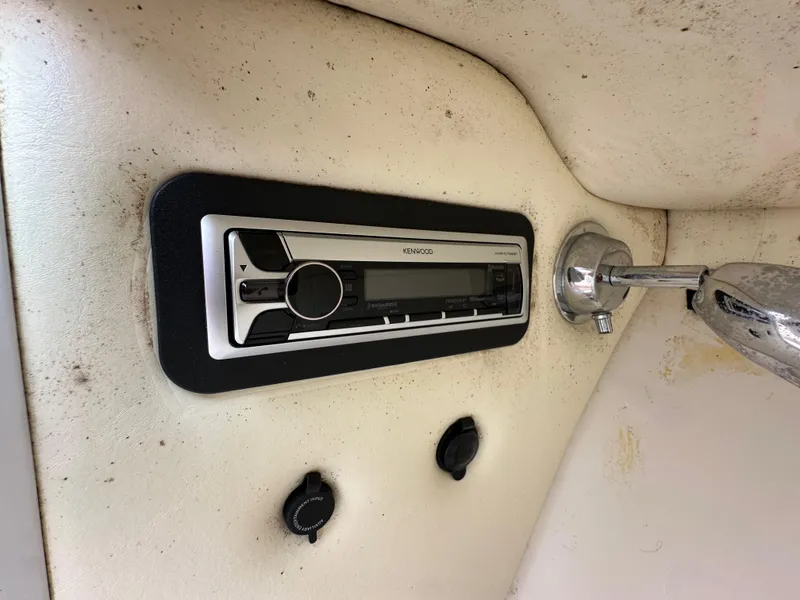 Slide: The Image of 2008 Chris-Craft Launch 25 dashboard with Kenwood stereo system. - 12