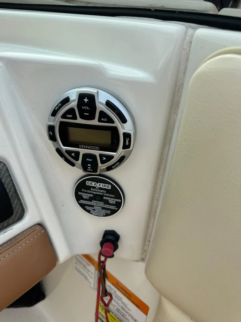 Slide: The Image of 2008 Chris-Craft Launch 25 dashboard with Kenwood stereo and Sea-Fire fire extinguisher indicator. - 18