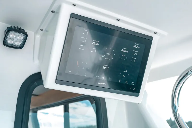 Slide: The Image of Garmin display on 2027 Lindell 41' boat, showing navigation and fuel data. - 14