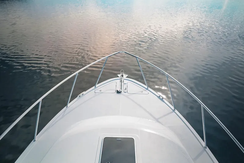 Slide: The Image of Bow view of 2027 Lindell 41' boat on calm water. - 19
