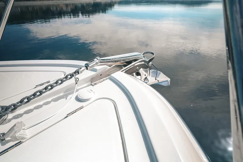 Slide: The Image of Bow of 2027 Lindell 41' boat with anchor and chain on calm water. - 20