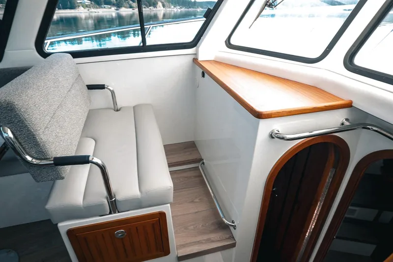 Slide: The Image of Interior of 2027 Lindell 41' boat with seating and wooden accents. - 26