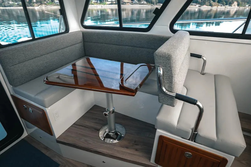 Slide: The Image of Modern interior of 2027 Lindell 41' boat with sleek seating and wooden table. - 29