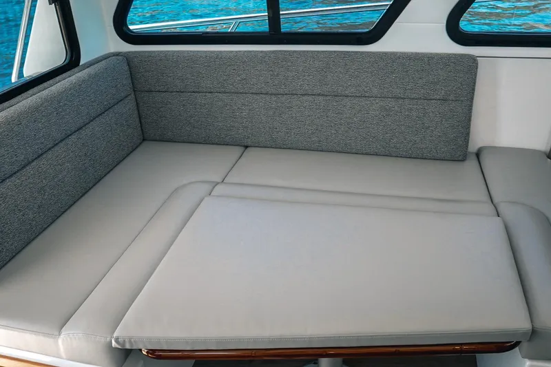 Slide: The Image of Luxurious seating area inside 2027 Lindell 41' boat with ocean view. - 31