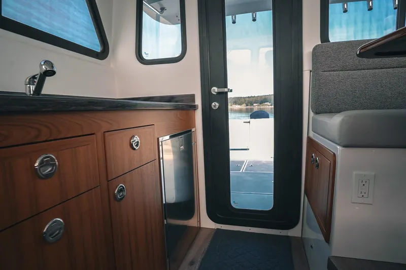 Slide: The Image of Interior of 2027 Lindell 41' boat featuring modern cabinetry and sleek design. - 34