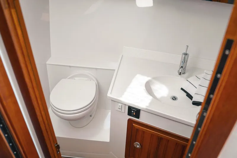 Slide: The Image of Modern bathroom in 2027 Lindell 41' yacht with toilet and sink. - 44