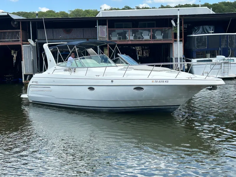 Slide: The Image of 1997 Cruisers Yachts 3575 Esprit boat docked at marina. - 7