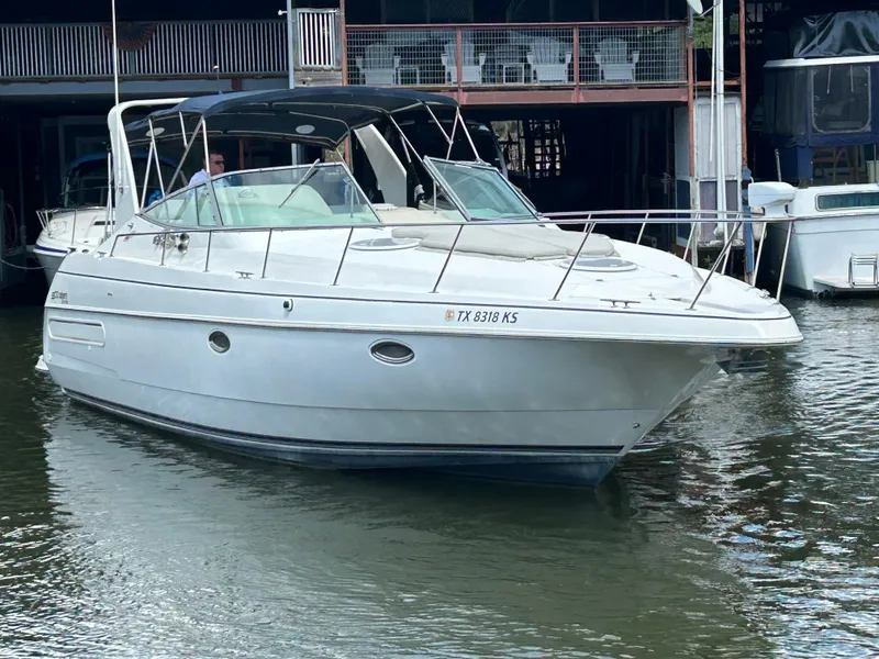 Slide: The Image of 1997 Cruisers Yachts 3575 Esprit boat docked in marina. - 9