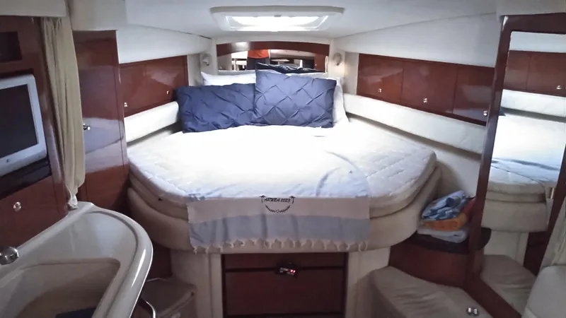 Slide: The Image of Luxurious cabin interior of a 2004 Sea Ray 340 Sundancer yacht. - 12