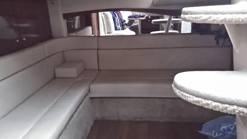 Slide: The Image of Interior seating area of 2004 Sea Ray 340 Sundancer yacht. - 14
