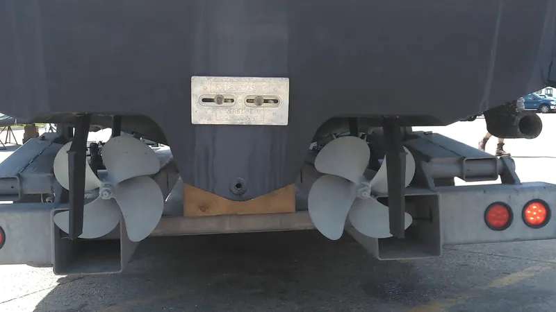 Slide: The Image of Rear view of a 2004 Sea Ray 340 Sundancer boat showing dual propellers. - 6