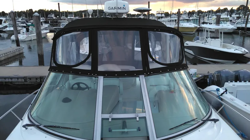 Slide: The Image of 2004 Sea Ray 340 Sundancer docked at a marina with Garmin radar. - 8