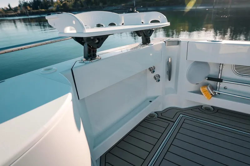 Slide: The Image of 2027 Lindell 42' boat deck with fishing rod holders and clean design. - 12