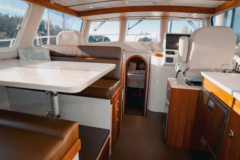 Slide: The Image of Luxurious interior of 2027 Lindell 42' yacht with elegant seating and modern amenities. - 19