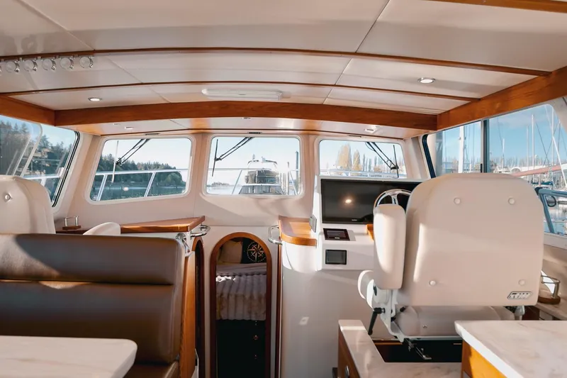 Slide: The Image of Interior of 2027 Lindell 42' yacht with modern helm and luxurious seating. - 21