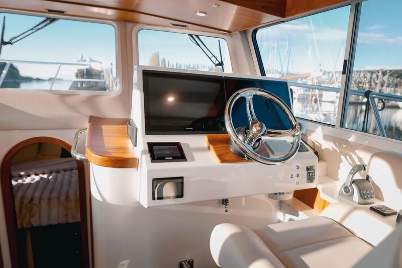 Slide: The Image of Modern helm of 2027 Lindell 42' yacht with sleek design and advanced navigation technology. - 22