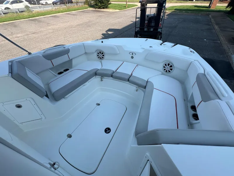 Slide: The Image of 2020 Tahoe 2150 CC boat interior with spacious seating and cup holders. - 12