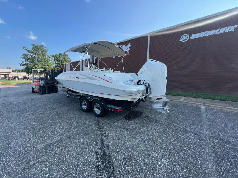 Slide: The Image of 2020 Tahoe 2150 CC boat on trailer, parked outside Mercury building. - 6