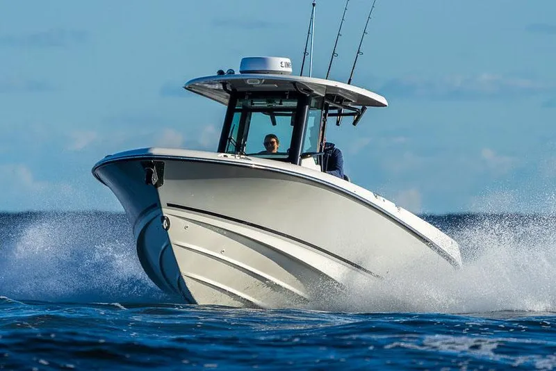 Slide: The Image of Manufacturer Provided Image: 2025 Boston Whaler 280 Outrage cruising on open water. - 1