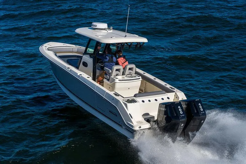 Slide: The Image of Manufacturer Provided Image: 2025 Boston Whaler 280 Outrage cruising on open water. - 2