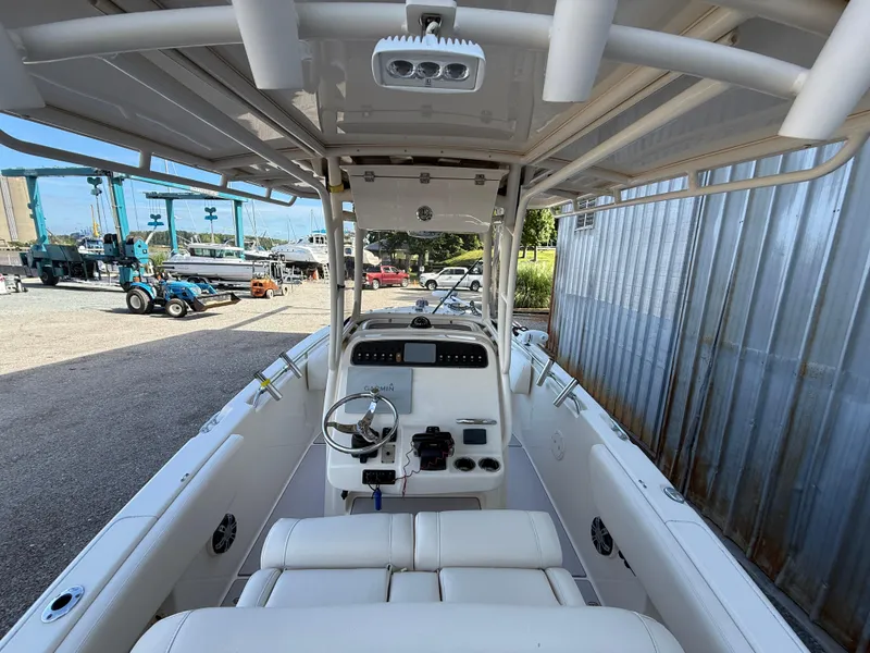 Slide: The Image of 2020 Grady-White Fisherman 257 boat interior with steering console and seating. - 13