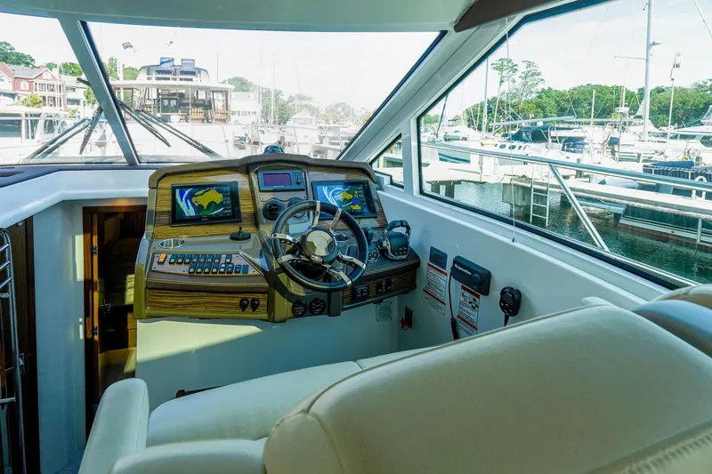Slide: The Image of Helm of 2016 Cruisers Yachts 45 Cantius with modern navigation equipment. - 13