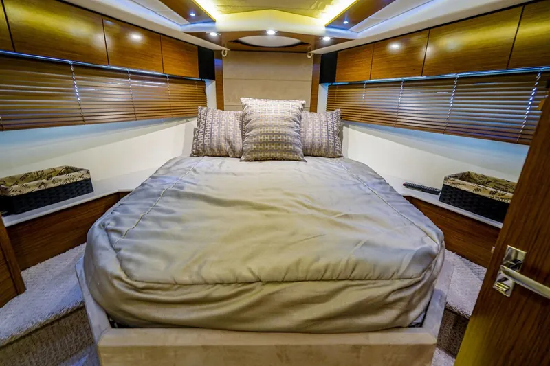 Slide: The Image of Luxurious bedroom interior of 2016 Cruisers Yachts 45 Cantius with modern design and cozy bedding. - 18