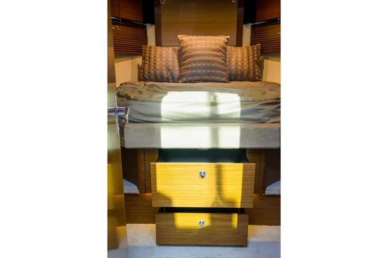 Slide: The Image of Luxurious bedroom interior of 2016 Cruisers Yachts 45 Cantius with stylish bedding and storage. - 19