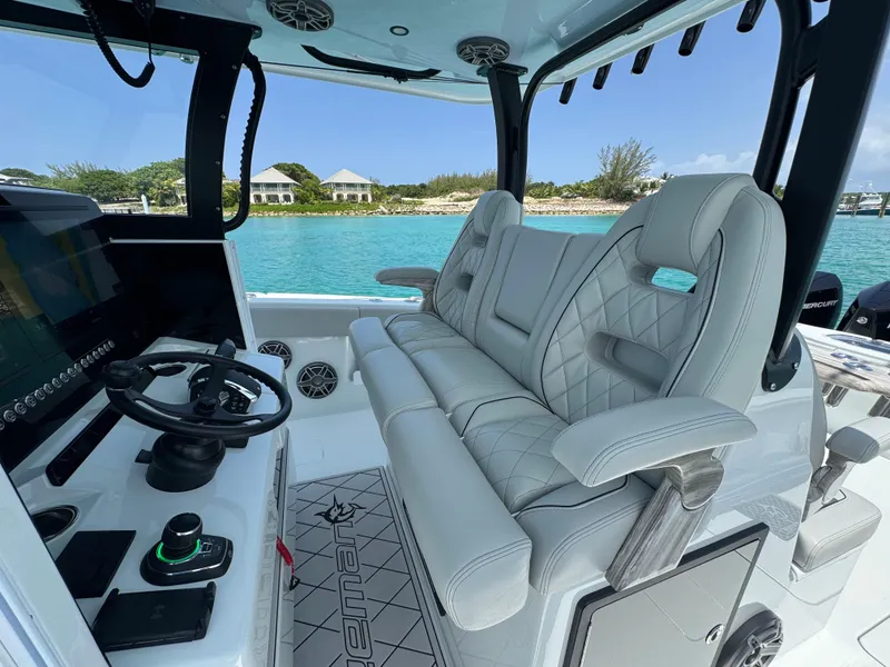 Slide: The Image of Luxurious interior of 2025 Freeman 38 boat with plush seating and advanced controls. - 15