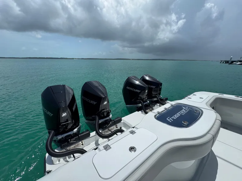 Slide: The Image of Freeman 38 boat with Mercury engines on a calm sea, 2025 model. - 30