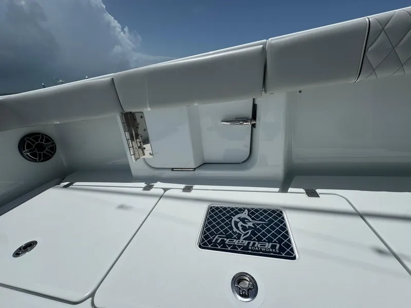 Slide: The Image of 2025 Freeman 38 boat interior with sleek design and branded detailing. - 38