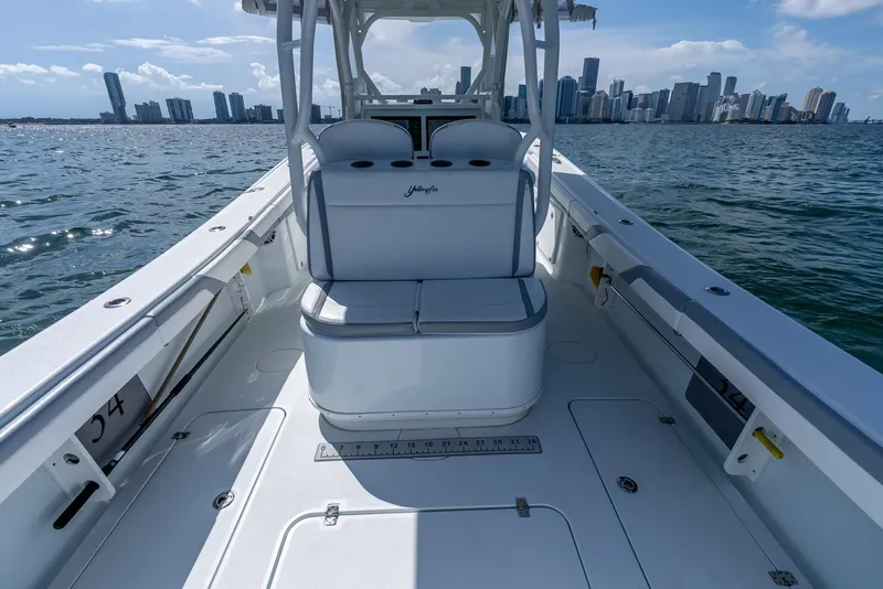 Slide: The Image of 2021 Yellowfin 34 boat interior with city skyline in the background. - 42