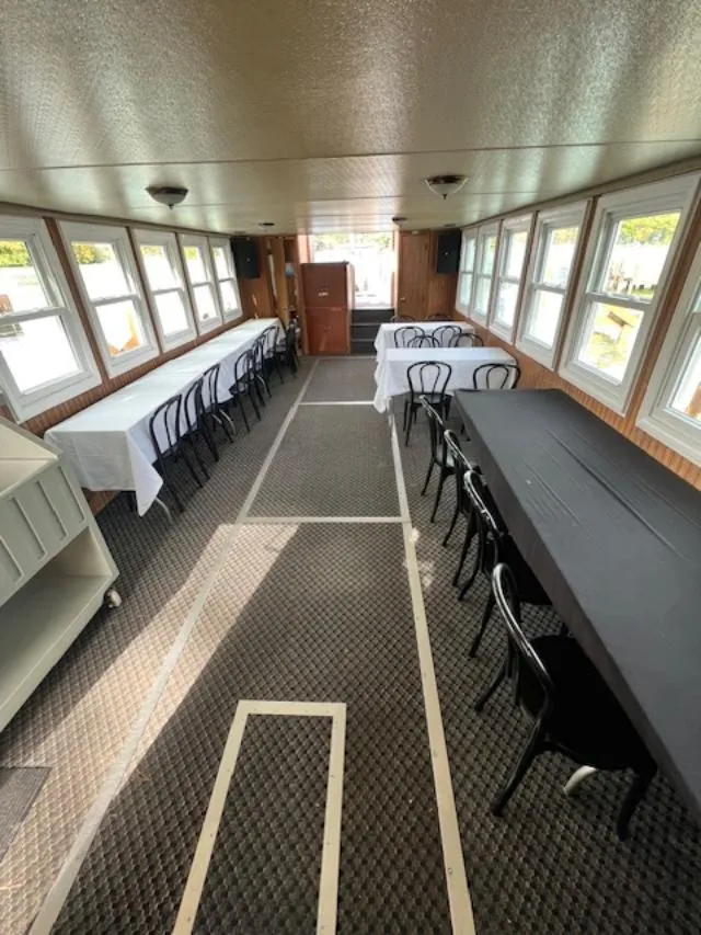 Slide: The Image of 1984 Skipperliner 54 helm with steering wheel, gauges, and navigation equipment. - 3