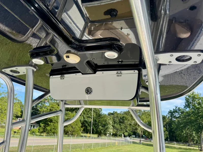 Slide: The Image of 2020 Sportsman Open 232 Center Console T-top with storage compartment and lights. - 15