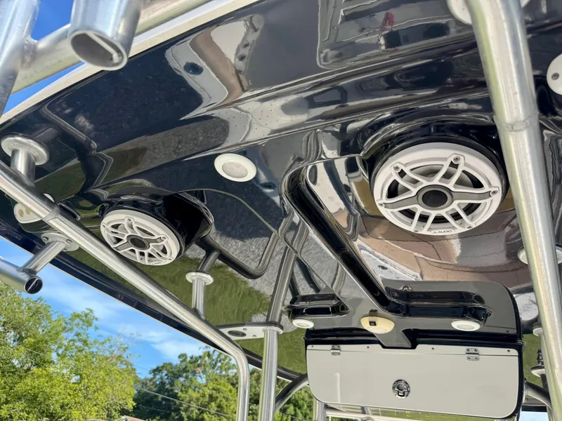 Slide: The Image of 2020 Sportsman Open 232 Center Console boat speakers and canopy detail. - 16