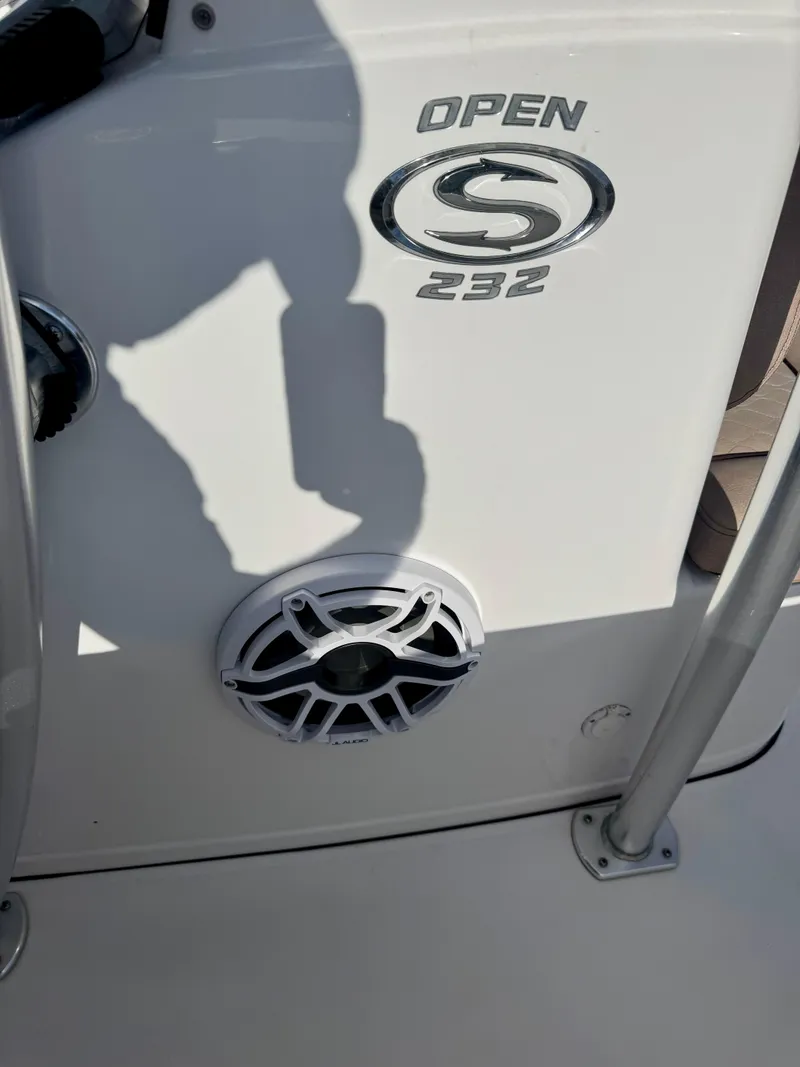 Slide: The Image of 2020 Sportsman Open 232 Center Console boat with speaker and logo detail. - 17