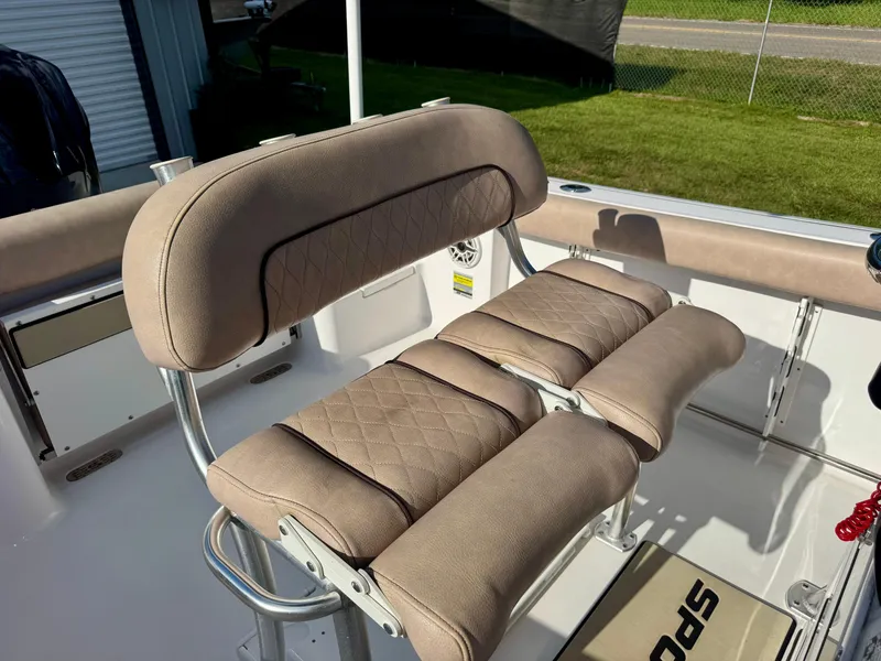 Slide: The Image of 2020 Sportsman Open 232 Center Console boat seat with beige cushioned upholstery. - 19