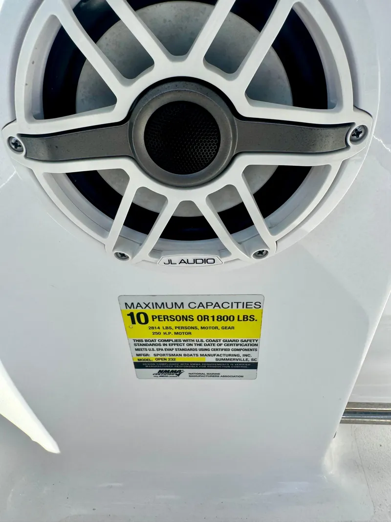 Slide: The Image of Speaker and capacity label on 2020 Sportsman Open 232 Center Console boat. - 21