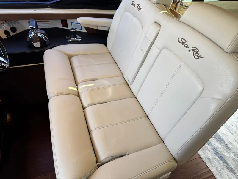Slide: The Image of Luxurious beige seating in 2014 Sea Ray 510 Sundancer yacht interior. - 18