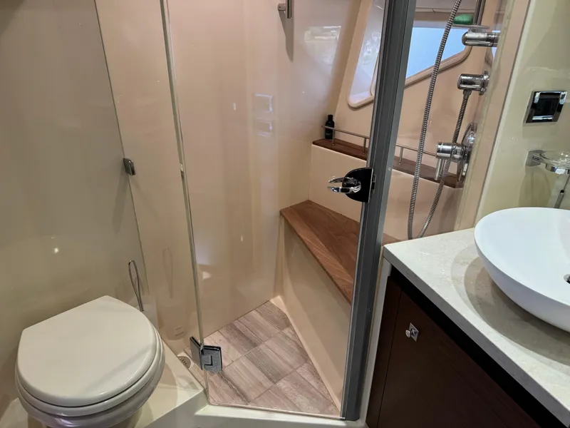 Slide: The Image of Luxurious bathroom in 2014 Sea Ray 510 Sundancer yacht with shower and modern fixtures. - 25
