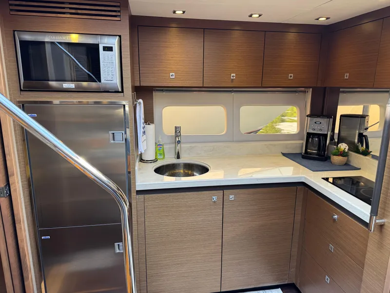 Slide: The Image of Luxurious kitchen interior of 2014 Sea Ray 510 Sundancer yacht with modern appliances. - 27