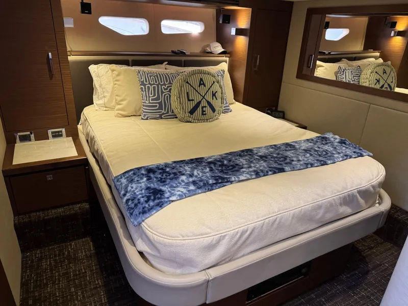 Slide: The Image of Luxurious bedroom interior of 2014 Sea Ray 510 Sundancer yacht with elegant bedding. - 29