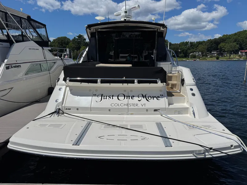 Slide: The Image of 2014 Sea Ray 510 Sundancer yacht docked, named "Just One More," in Colchester, VT. - 3