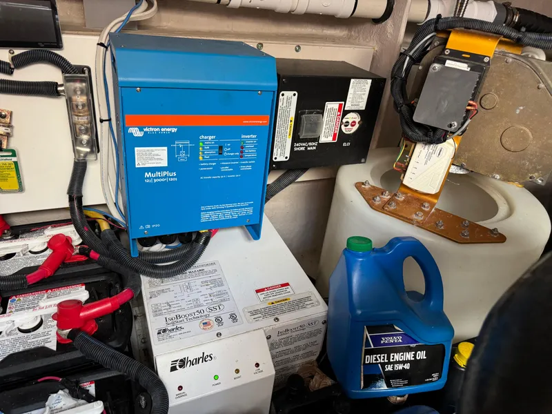 Slide: The Image of Engine room of 2014 Sea Ray 510 Sundancer with Victron Energy MultiPlus inverter and diesel engine oil. - 48