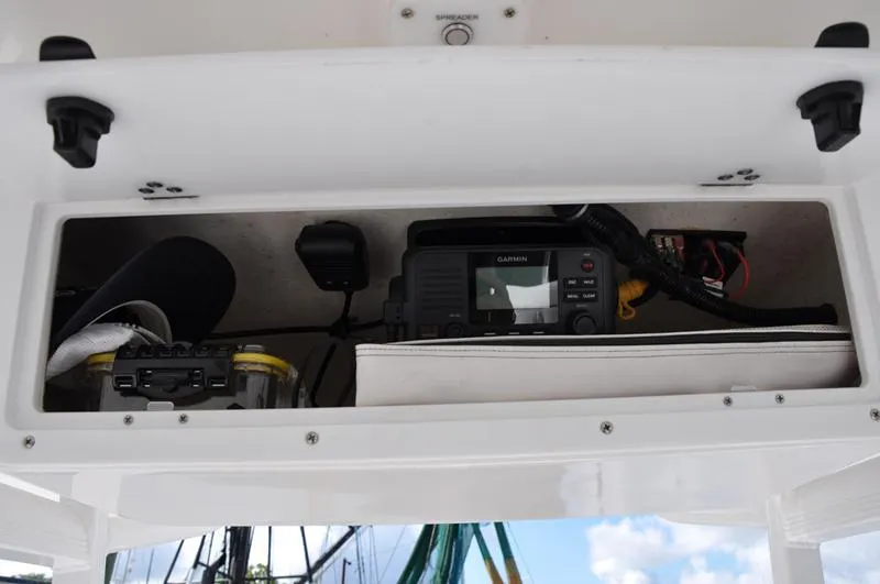Slide: The Image of Storage compartment in a 2020 Sea Hunt Ultra 225 boat with Garmin electronics. - 17