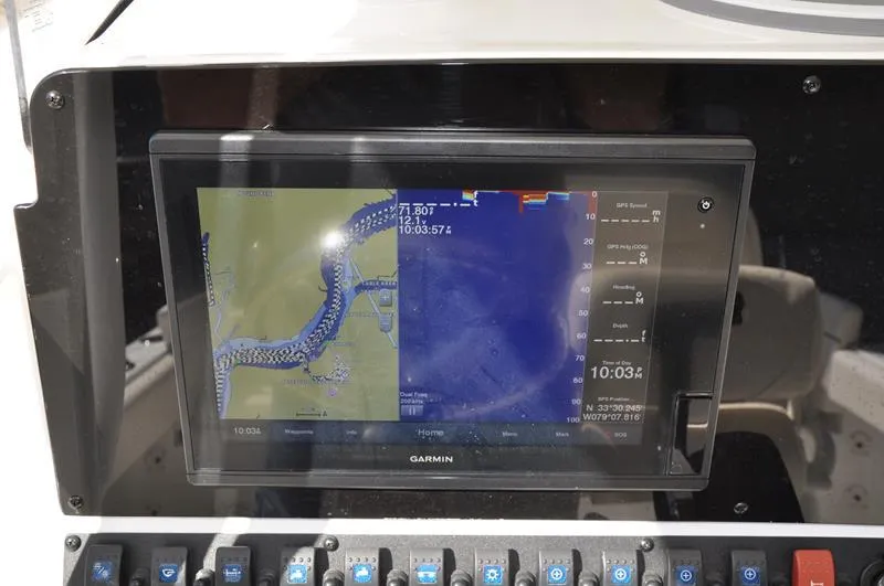 Slide: The Image of Garmin navigation display on 2020 Sea Hunt Ultra 225 boat dashboard. - 25