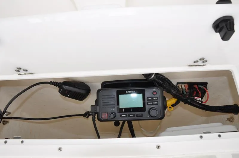 Slide: The Image of Garmin marine radio installed in 2020 Sea Hunt Ultra 225 boat compartment. - 27