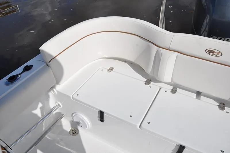 Slide: The Image of 2020 Sea Hunt Ultra 225 boat interior with seating and storage compartments. - 8