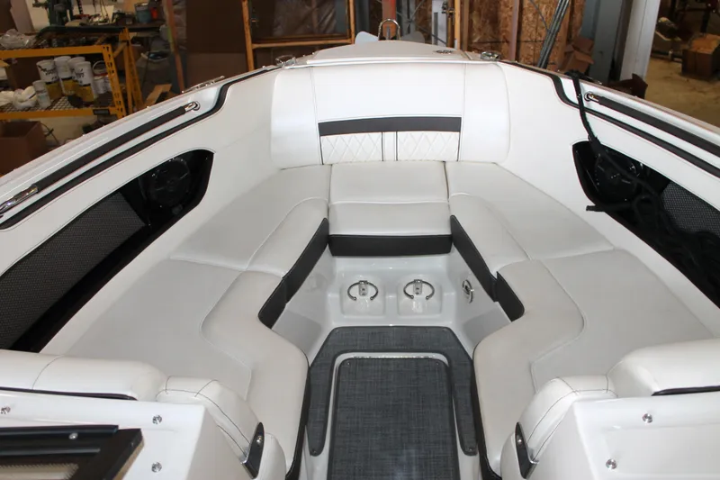 Slide: The Image of 2018 Sea Ray 280 SLX boat interior with white seating and modern design. - 25